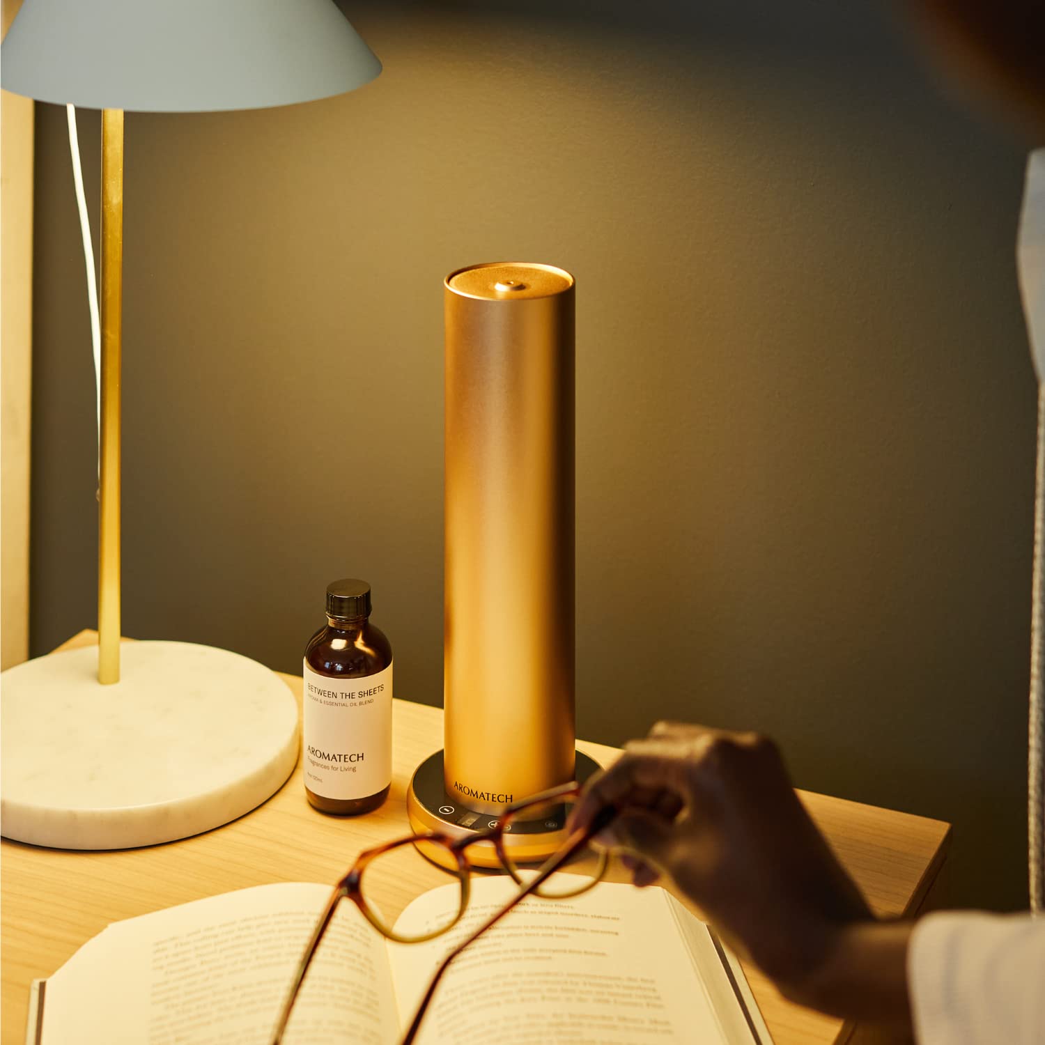 Cozy and indulgent mood representing Between The Sheets fragrance