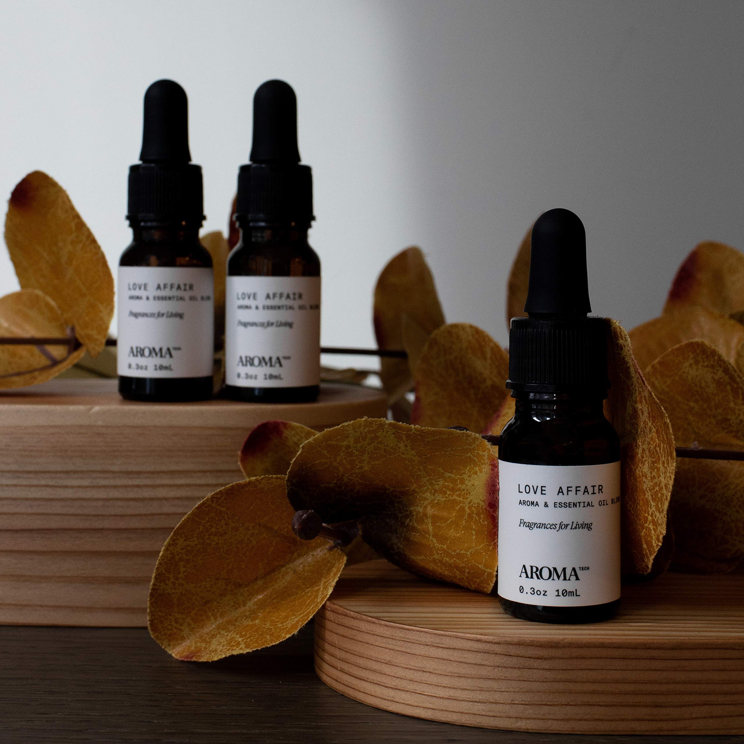 A diffuser with AromaTech oils in a modern living room