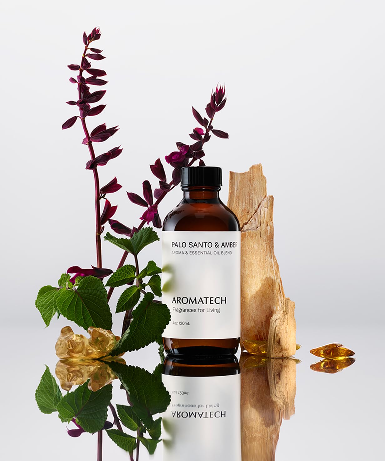 AromaTech Palo Santo & Amber bottle with diffuser scene