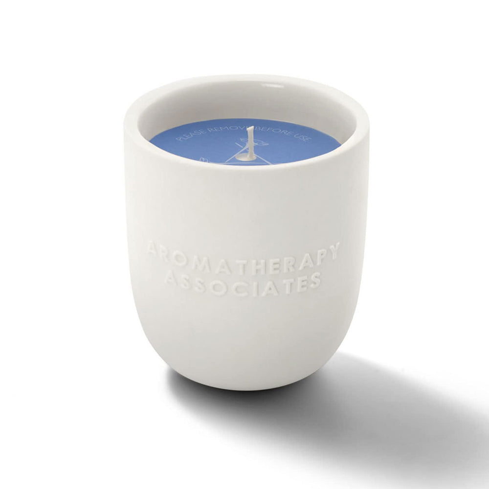 Aromatherapy Associates Deep Relax Candle wax pool highlighting vegan wax and burn time