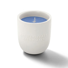 Aromatherapy Associates Deep Relax Candle wax pool highlighting vegan wax and burn time