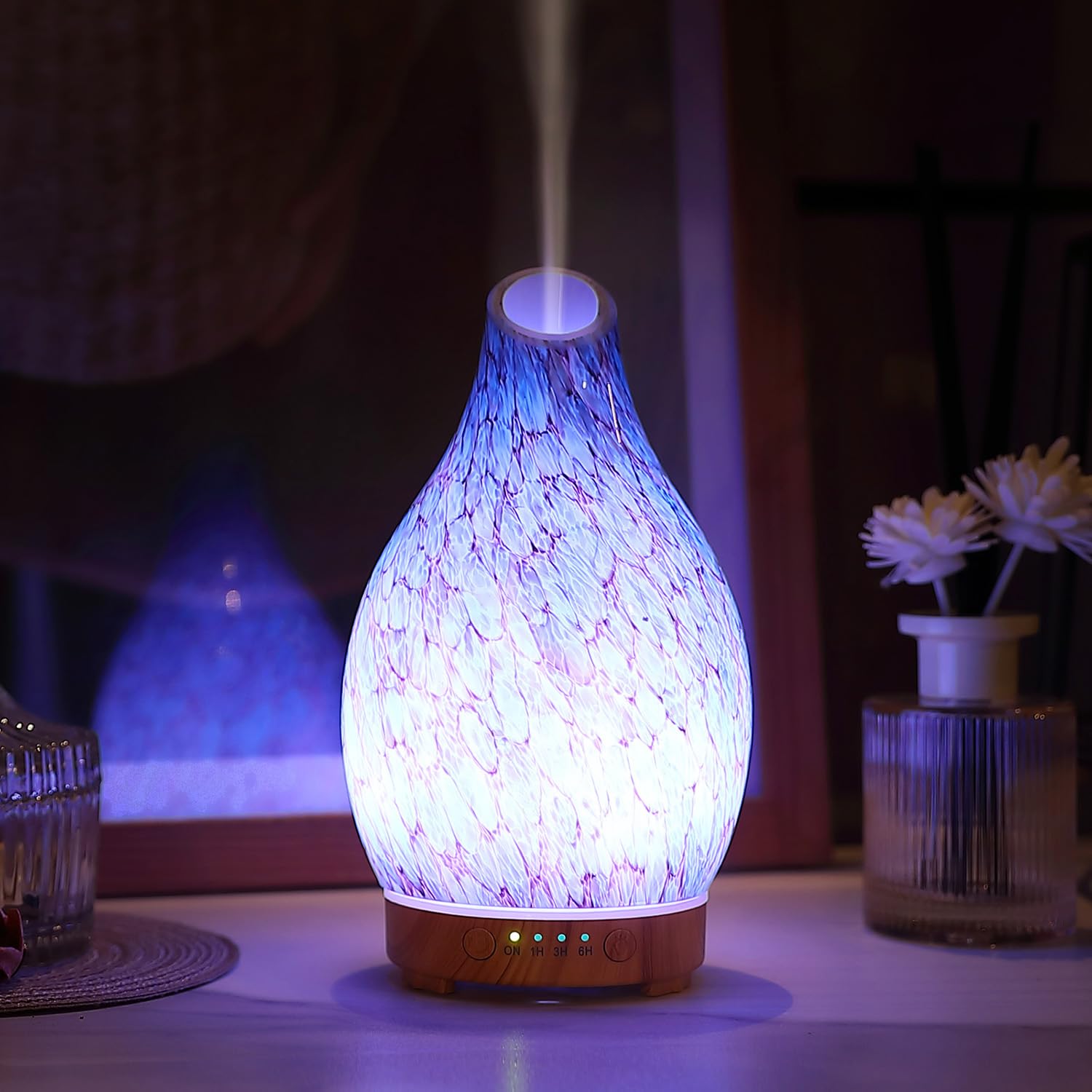 Decorative art glass diffuser placed in office or living room
