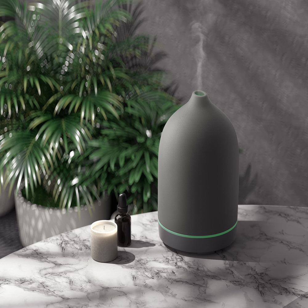 Elegant grey ceramic essential oil diffuser as a modern living room accent