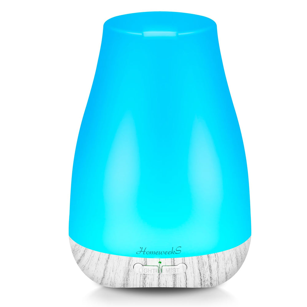 Aromatherapy essential oil diffuser for room in compact palm-size design