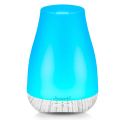 Aromatherapy essential oil diffuser for room in compact palm-size design