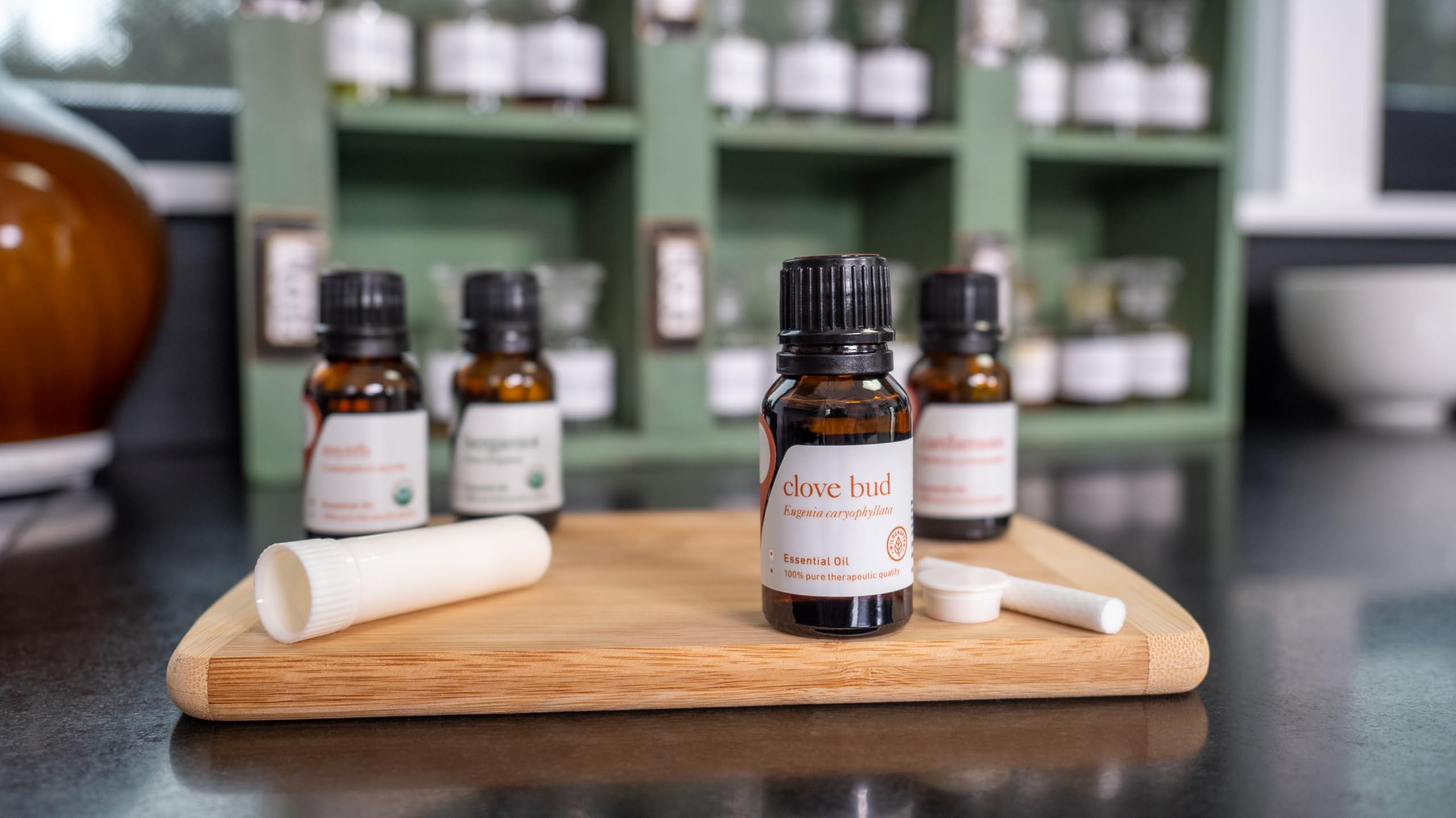 Aromatics International clove bud oil drops—pure aroma to purify air and relax.