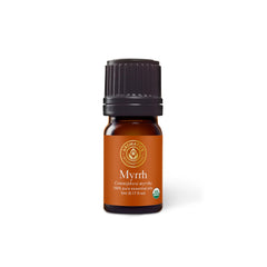 Aromatics International myrrh essential oil bottle highlighting small-batch, pure oil for diffusion and wellness rituals.