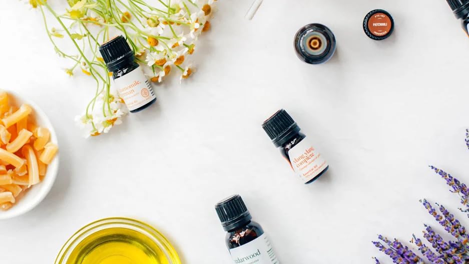 Aromatics International ylang ylang essential oil packaging eco-friendly materials.