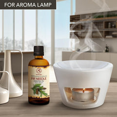 AROMATIKA Fir Needle Essential Oil pour close-up emphasizes pure, natural aroma.