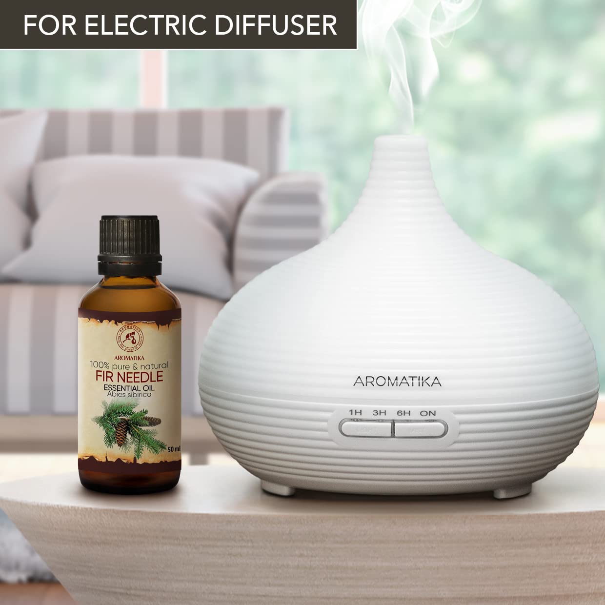 AROMATIKA Fir Needle Oil diffuser setup releasing calming mist for room ambiance.