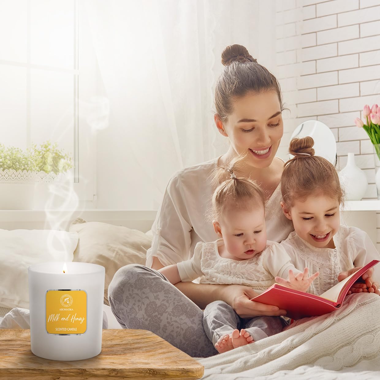 AROMATIKA Milk & Honey candle scent profile evokes creamy warmth.