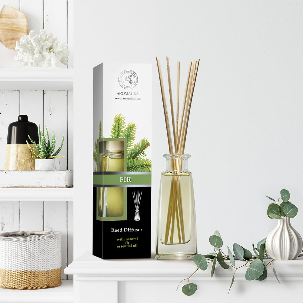 AROMATIKA Pine Reed Diffuser label highlights botanicals and usage tips.