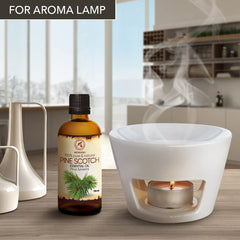AROMATIKA Pine Scotch Oil diffuser lamp creating calming ambiance.