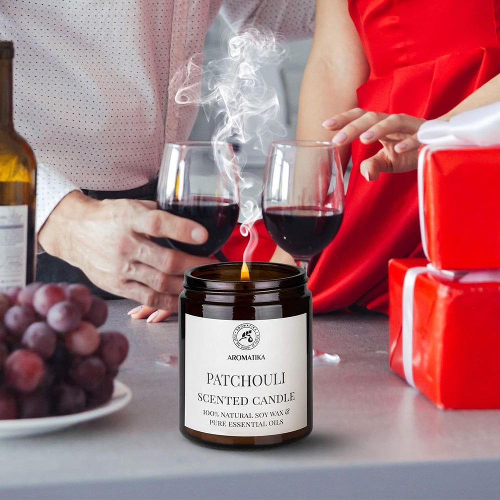 AROMATIKA Patchouli candle creating warm room ambiance
