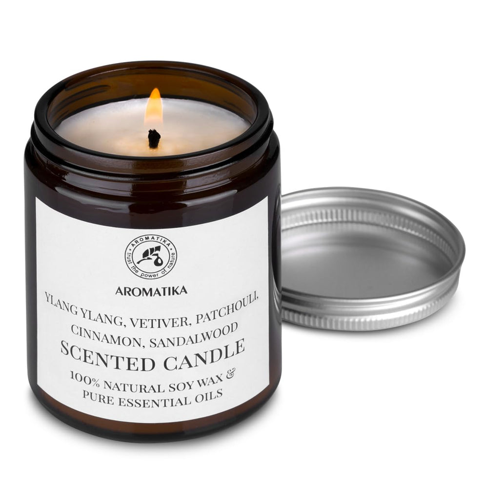 AROMATIKA scented candle vetiver cinnamon sandalwood close-up enhances warm ambiance for evenings.