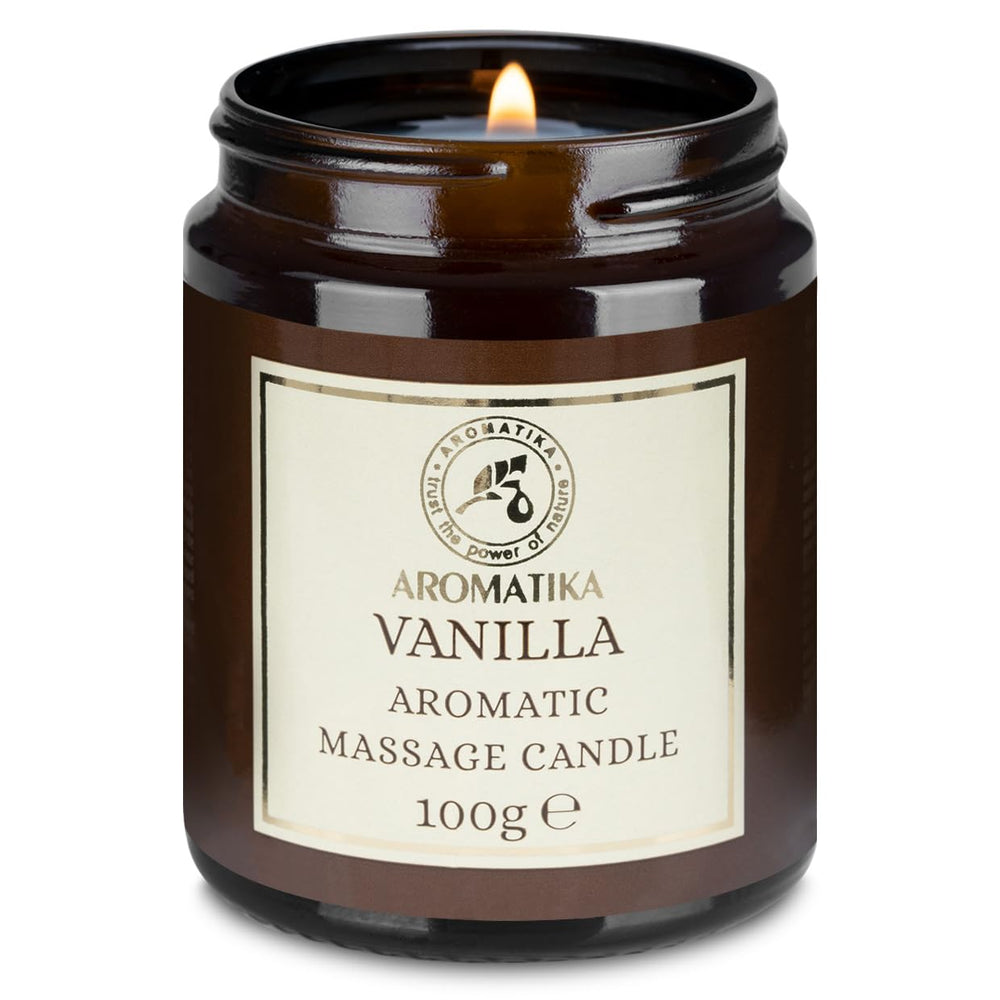 AROMATIKA Scented Massage Candle Vanilla pour captures a cozy scene, offering skin-nourishing massage and calming aroma.