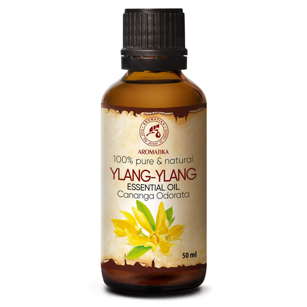 AROMATIKA Ylang-Ylang oil bottle closeup highlighting pure floral notes for aromatherapy.