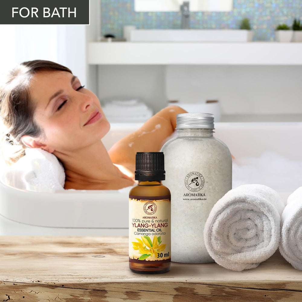 AROMATIKA Ylang Ylang oil closeup showing natural purity for skincare.