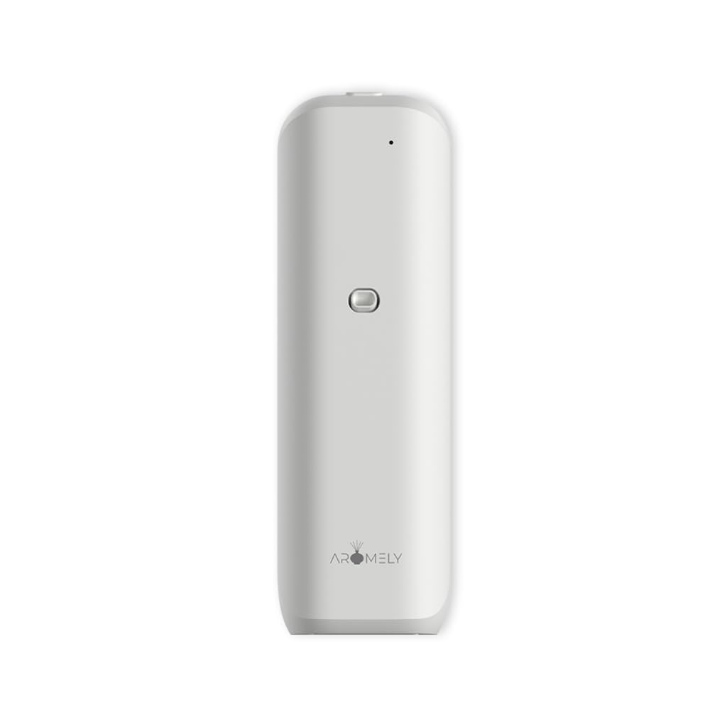 Aromely ARO Bliss plug-in oil diffuser plugged into outlet