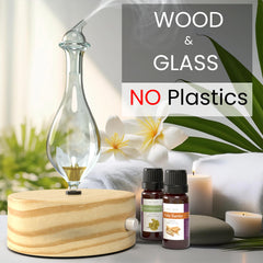 Close-up of borosilicate glass reservoir in natural pine wood base