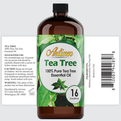 Amber glass bottle of Tea Tree essential oil with screw cap