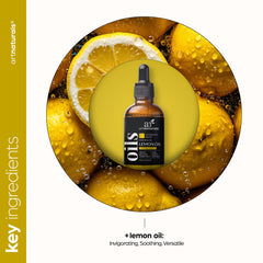 Lemons with ArtNaturals Lemon Essential Oil bottle