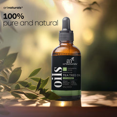 Flat lay of tea tree oil surrounded by natural skincare items