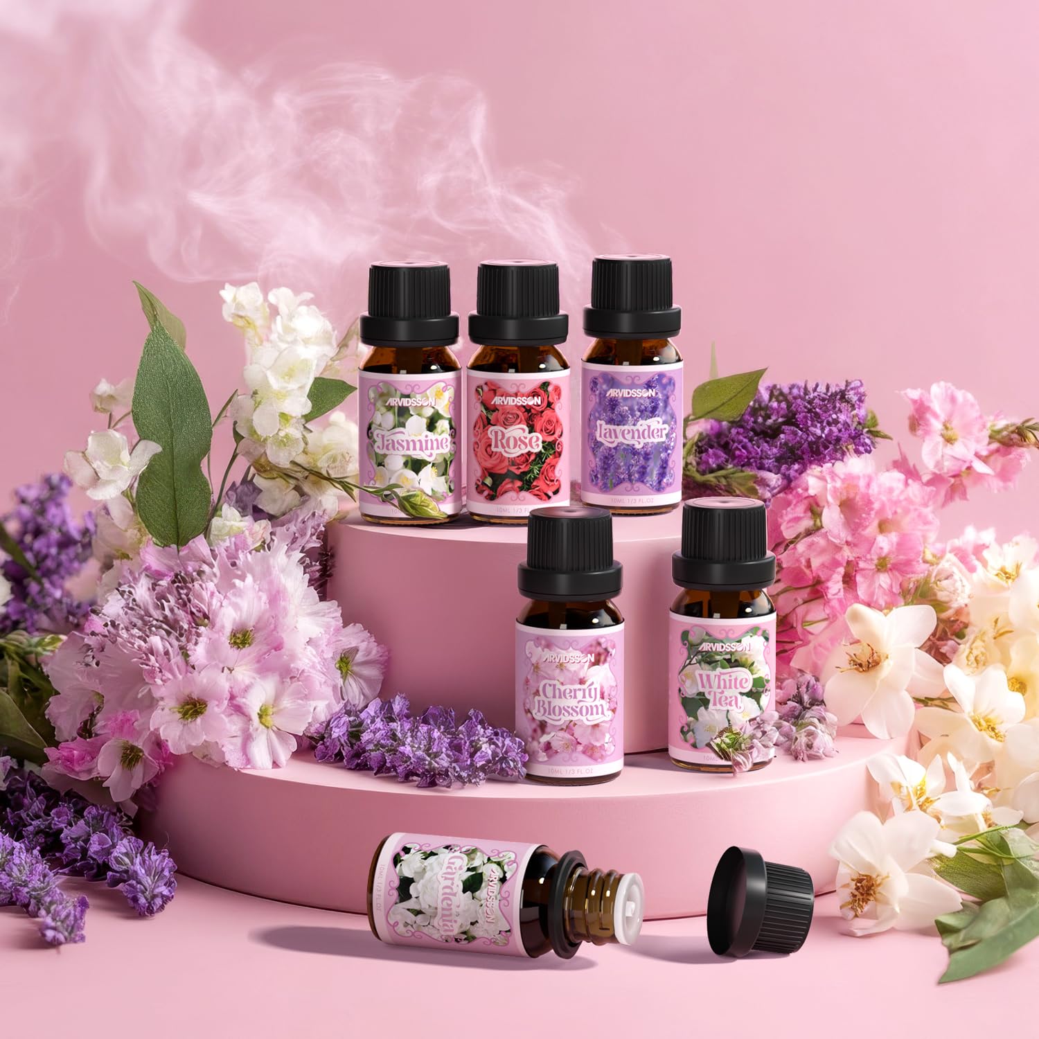 White Tea essential oil bottle with white tea flowers