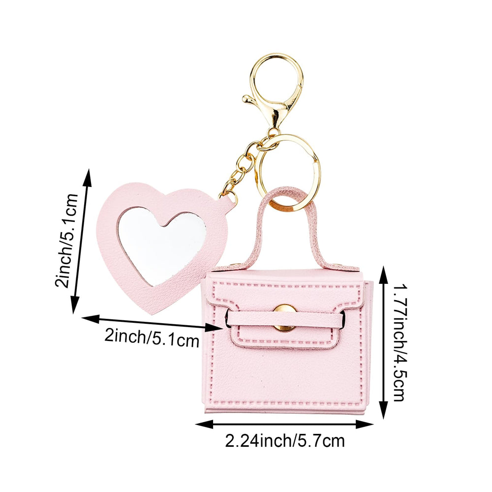 Arvintas leather keychain rucksack charm with heart mirror for bags or keys.