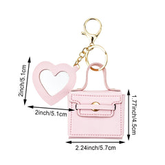 Arvintas leather keychain rucksack charm with heart mirror for bags or keys.