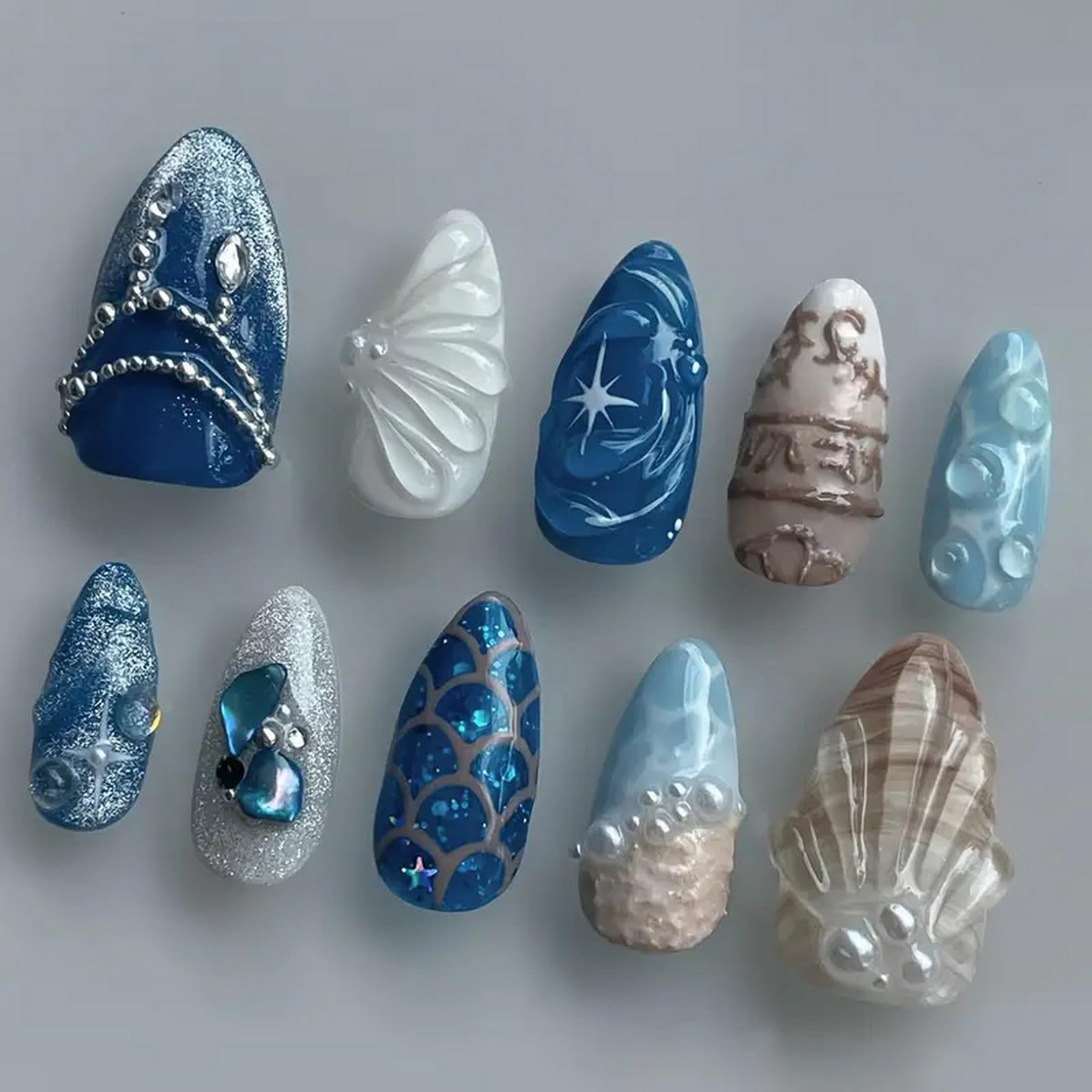 ASABITE handmade acrylic almond nails showing 3D pattern and gel finish.