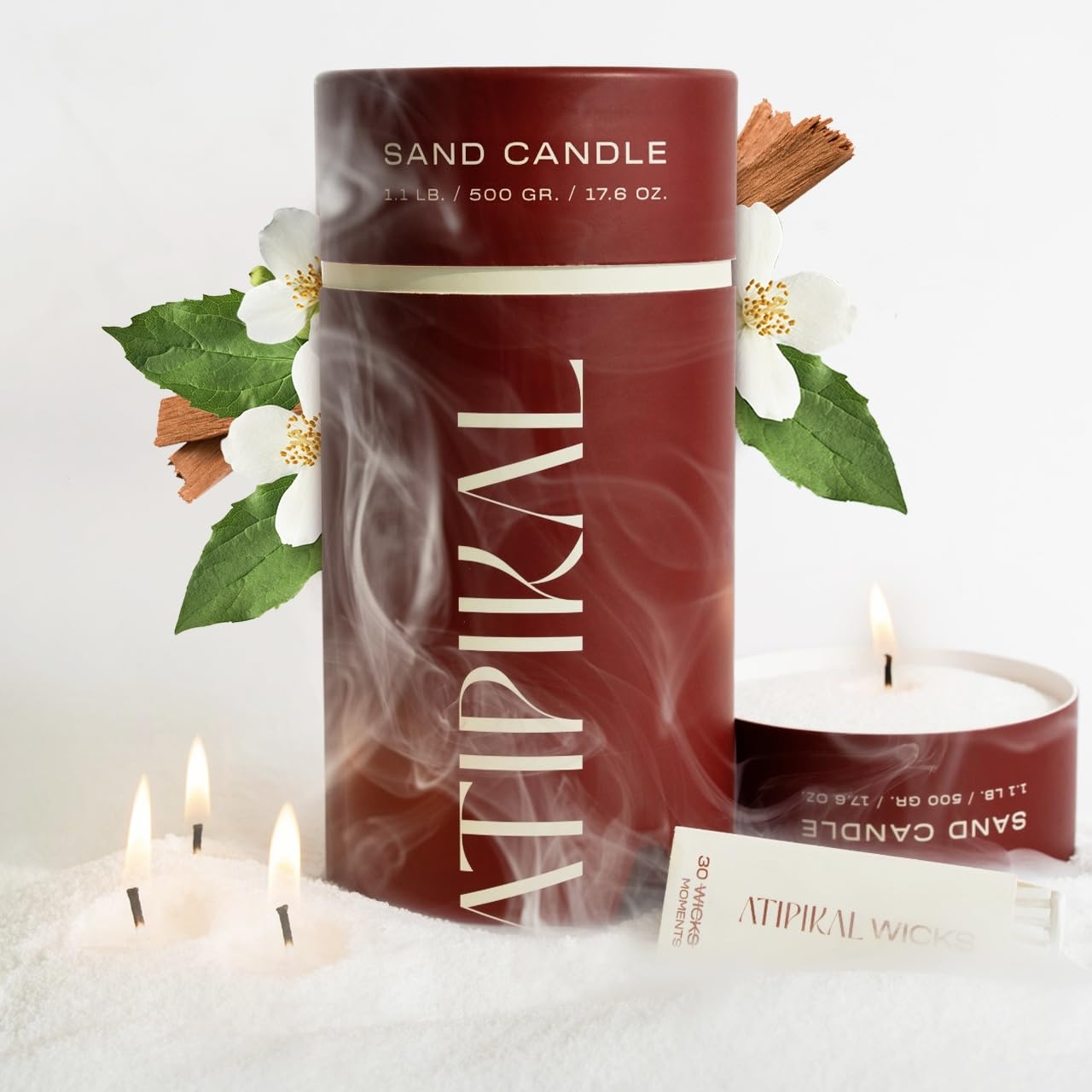 Atipikal Sand Candle 18oz with Saldalwood Jasmine scent floating on water