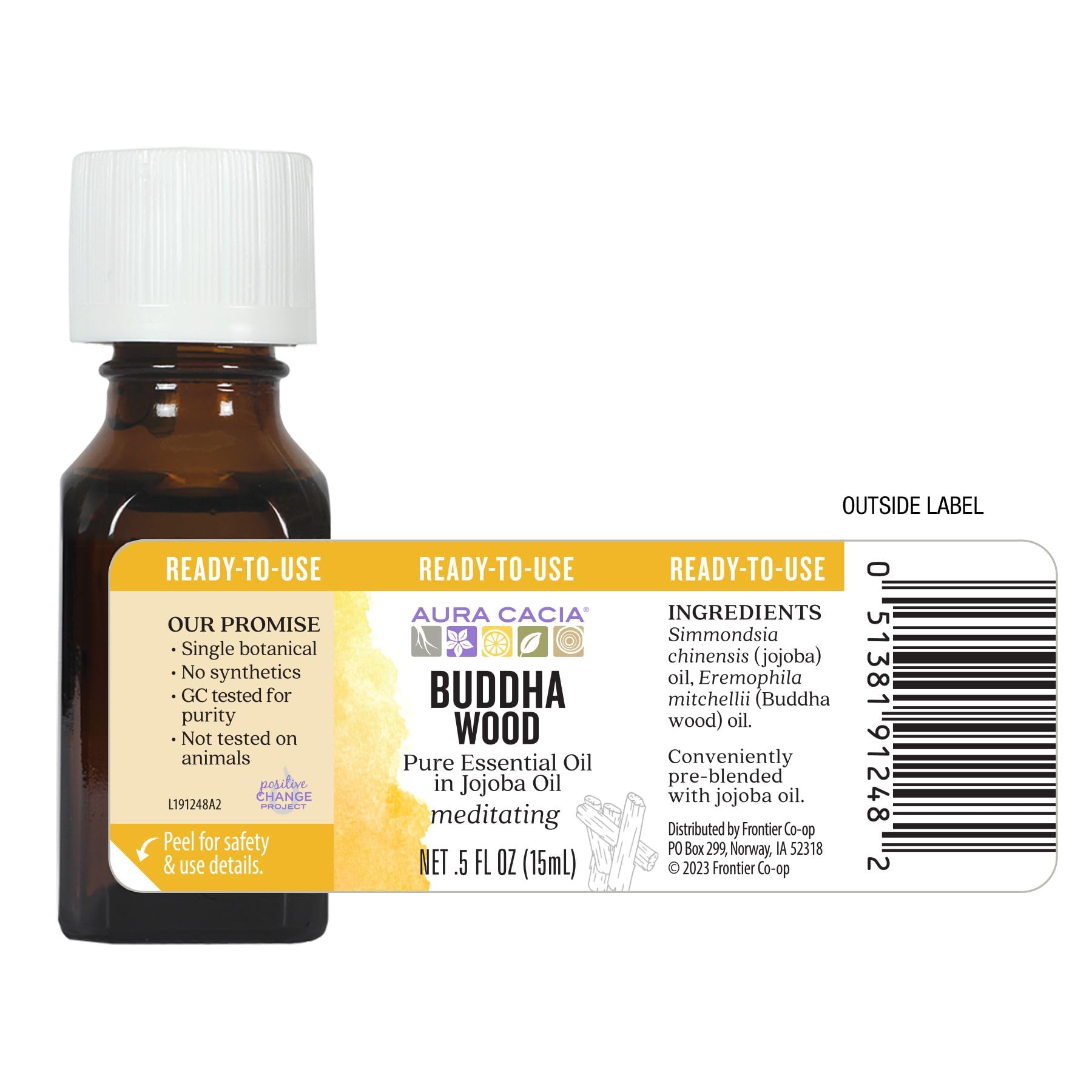 Aura Cacia Buddha Wood drops on skin for subtle daily calm.