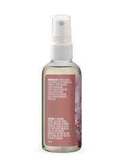 Aura Cacia room & body mist being used in a car