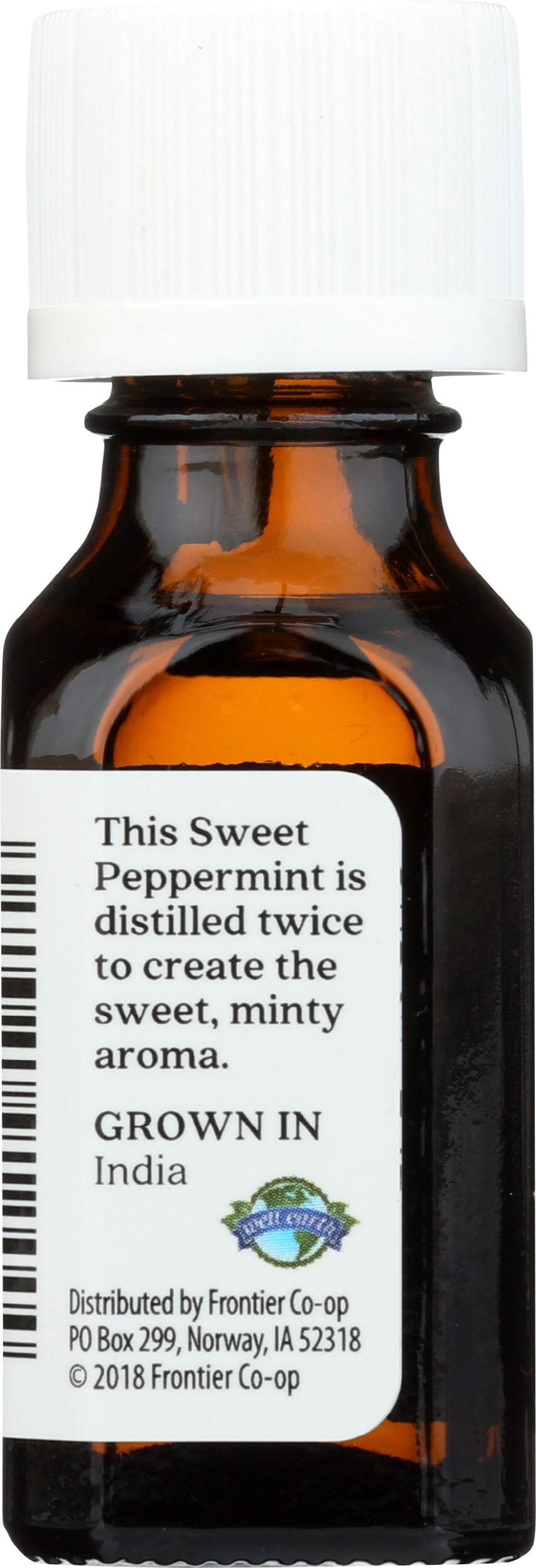 Aura Cacia peppermint label closeup highlights origin and oil quality