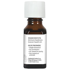 Close-up image of Aura Cacia Sweet Basil Essential Oil label