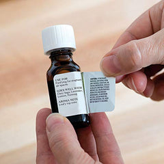 Eco-friendly packaging for Aura Cacia Tea Tree Oil