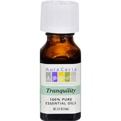 Aura Cacia Tranquility essential oil bottle for calming aromatherapy.