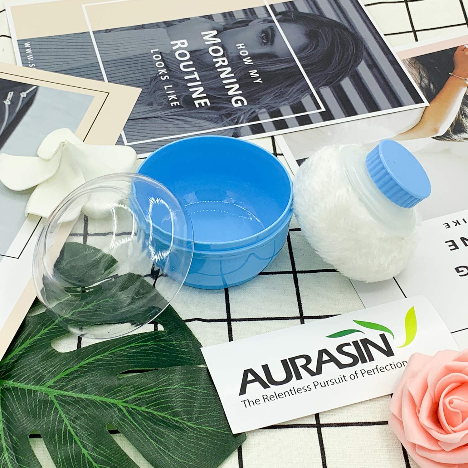 AURASIN large fluffy powder puff for smooth powder distribution on skin.