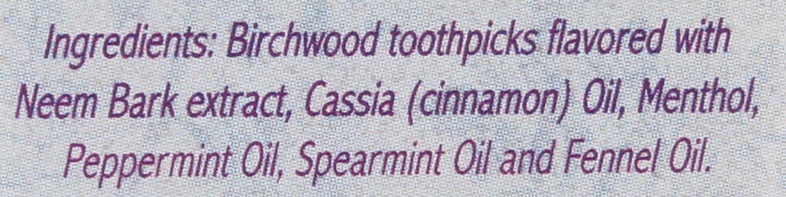 Close-up of neem-infused birchwood toothpicks