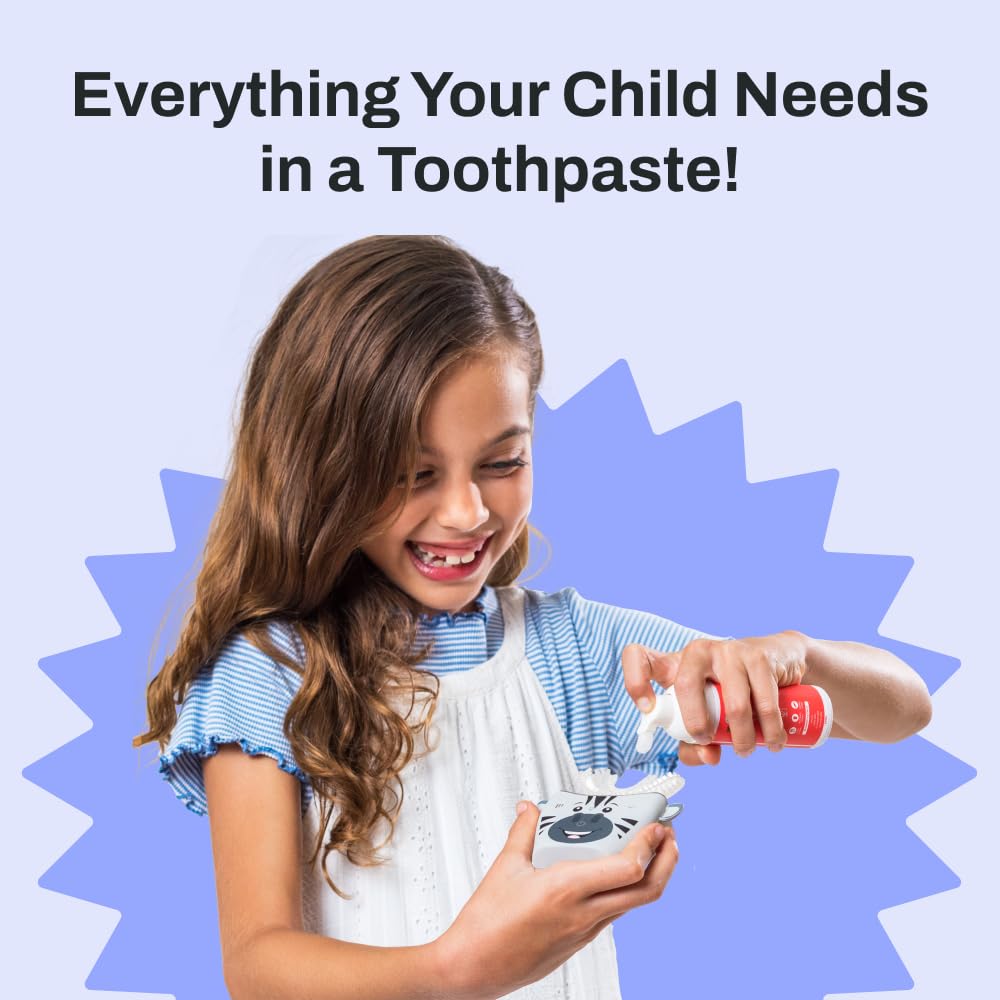 Kid brushing with autobrush toothpaste