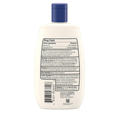 Lotion being applied beneath a clothing sleeve, discreet and quick-absorbing.