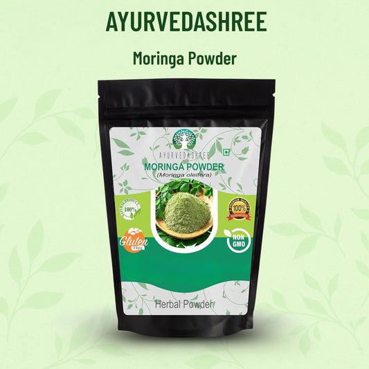 Close-up of Moringa Olifera powder in scoop
