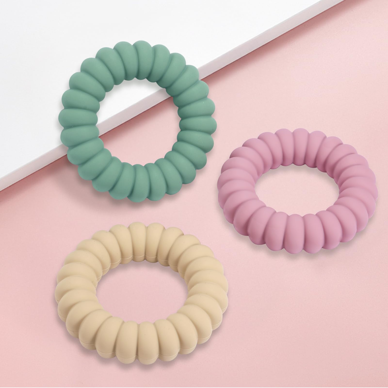 Diaper bag with three-pack silicone teether rings