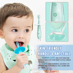 Baby toothbrush with suction base attached to table to prevent falls