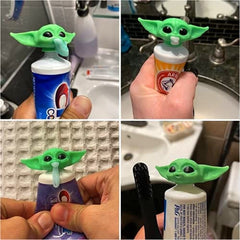 Funny Baby Yoda toothpaste cap in action