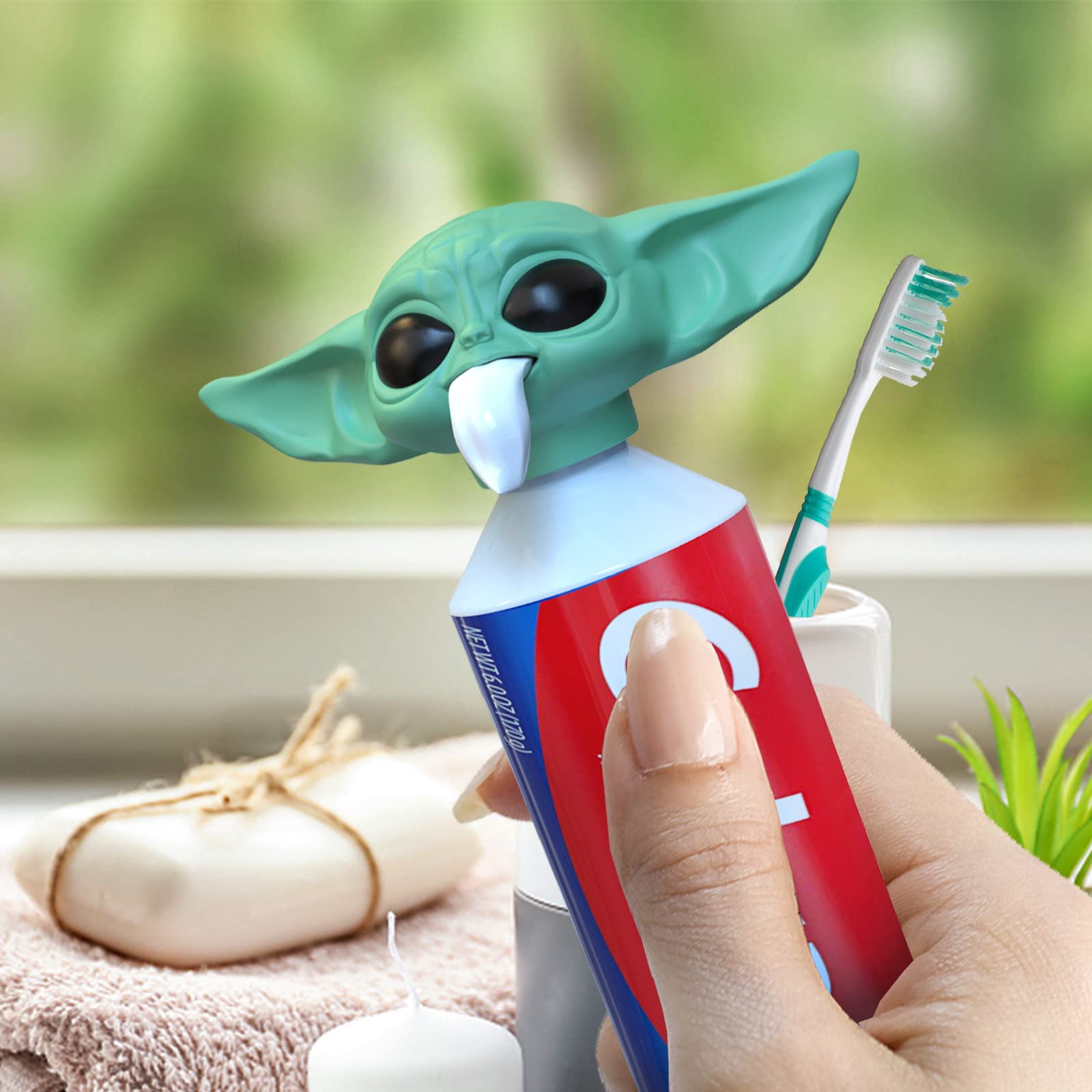 Front view of Baby Yoda toothpaste topper cap