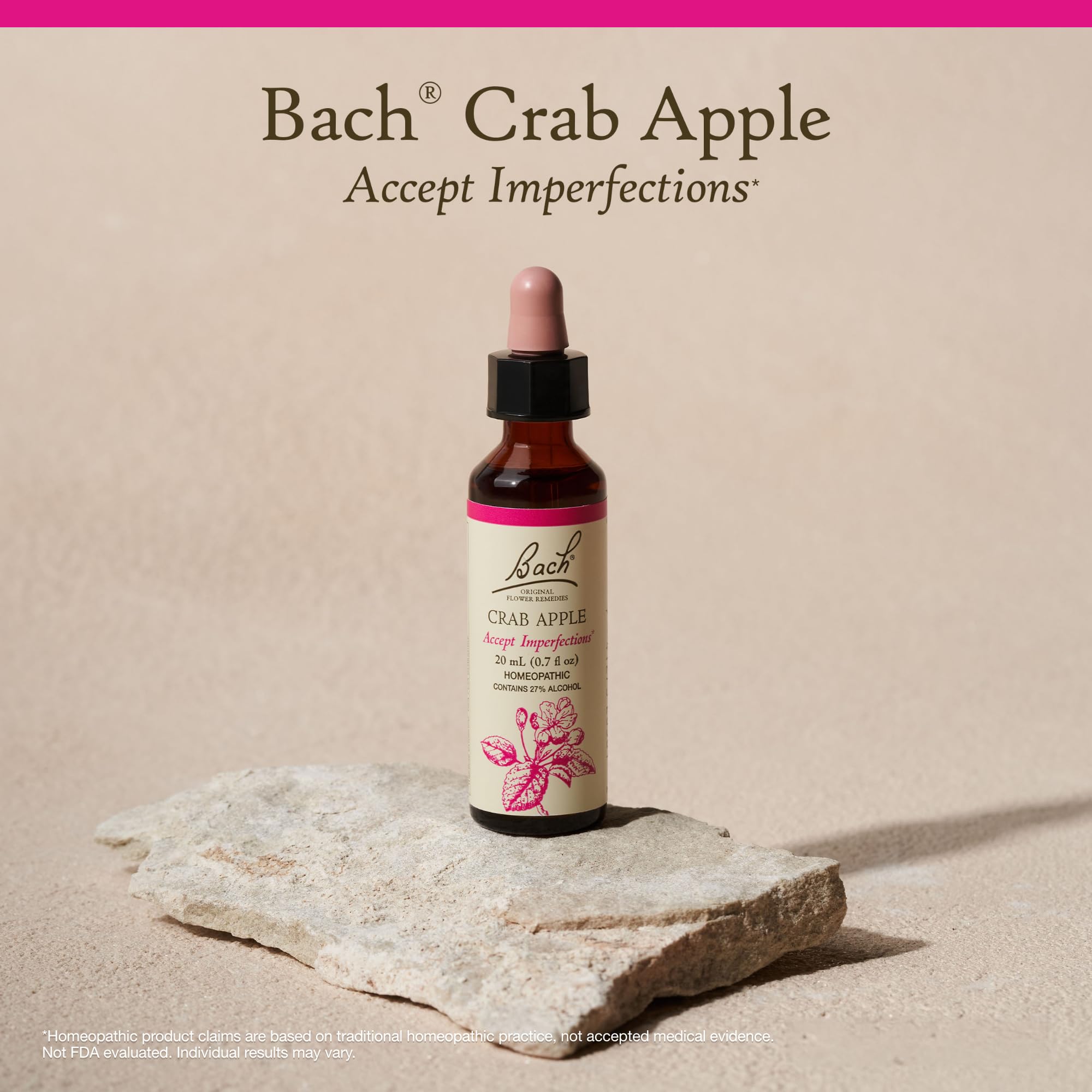 Hand holding Bach Crab Apple bottle for scale and portability, showing travel-friendly size