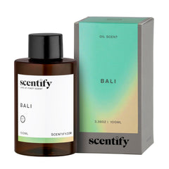 Bali aroma oil refill for diffusers featuring lemon, green, amber and woody notes in a 100ml bottle.