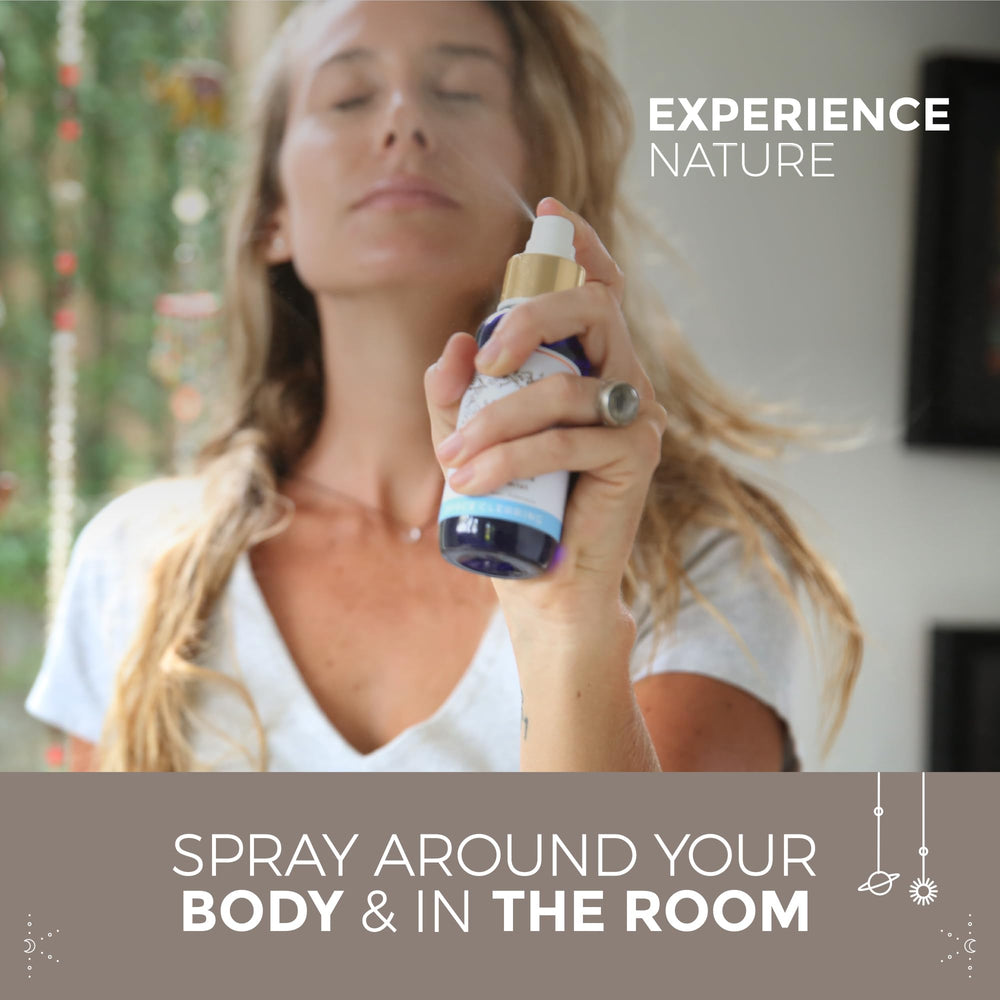 Crystal infused healing mist swirling above hands